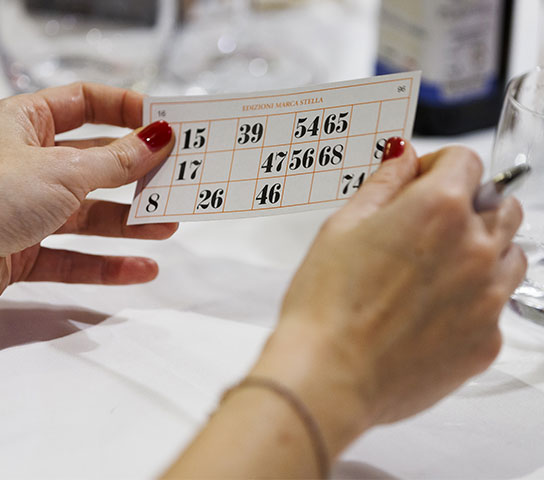 Christmas bingo moment during a company event, with participants engaged in the game.